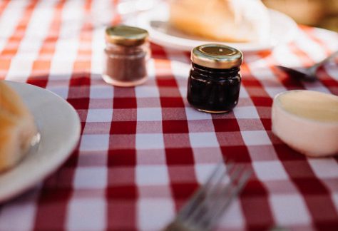 small jars with jam on table